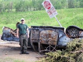 Blaine Burke, public information education outreach officer for Alberta Sustainable Resource Development, at the annual Wapiti Sand Dunes clean-up.