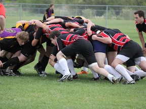 The Father Mercredi boys rugby team scrums with the Lloydminster Comprehensive High School Barons during the Northeast zone championship game Saturday in Lac La Biche, Both Trappers rugby teams won the zone championship this past  weekend. PATRICIA VIALE/SUPPLIED PHOTO