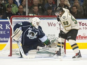 Plymouth Whalers goalie Matt Mahalak makes a save on London Knights forward Bo Horvat during an Ontario Hockey League game in London last October. Mahalak, entering his overage season, was acquired by the Kingston Frontenacs on Monday. (Craig Glover/QMI Agency)