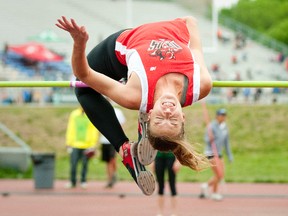 Woodstock Collegiate's Alyssa Bickle makes a jump in the senior girls high jump at the WOSSAA track and field championship May 23, 2013. Bickle won silver at OFSAA West Regionals last weekend with a jump of 1.65-metres to qualify for her fourth OFSAA finals. Kevin Holden of Huron Park also qualified for OFSAA finals winning gold in the junior boys pole vault with a 3.45-metre vault and WCI's Matt Zilke won bronze in the junior boys javeline with a toss of 51.08-metres.

CRAIG GLOVER The London Free Press / QMI AGENCY