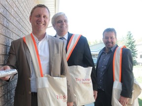 Sudbury Star Publisher and Advertising Director David Kilgour, who is also a director with the Sudbury Food Bank, Sudbury Police Chief Frank Elsner, who is the new chair of the food bank, and Geoffrey Lougheed, past chair.