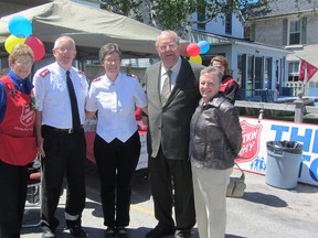 Pictured (left to right) are volunteers Dianne Wright, David and Donna Kennedy and Eric and Kathy Eastwood enjoying the 25th anniversary of the Salvation Army on May 25, 2013.