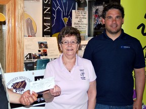 KidSport Timmins received a $2,500 donation from Tradex, the company that organized the bulk of the Big Event Mine Expo, after the organization and its volunteers spent two days organizing the monumental task of parking at the event. From left are Gary Boucher, Colleen Landers and David Vodusek.