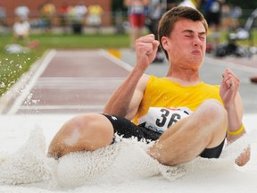 Central Elgin's Riley Bell long jumps to the gold medal in 2012 at the OFSAA track and field championships in Brockville. He'll be looking to hold on to that title at the provincial meet which begins Thursday in Oshawa. (QMI Agency files)