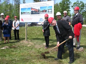 Doug Shearer, chairman of District School Board Ontario North East, had the honour of making the symbolic first cut at a sod-turning ceremony for the board’s new administration building in Schumacher. With the start of construction expected shortly, the building should be ready by June 2014.