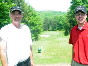 Shelter Valley Pines Golf Club owner Steve Sawyer (left) and manager Jason Vanderwal stand on a tee box overlooking one of the scenic par 3 holes. 
Ernst Kuglin Trentonian