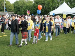 Cancer survivors and caregivers celebrate the cause with a victory lap to kick off the 2011 Relay for Life in support of the Canadian Cancer Society at Lakewood School in Kenora, ON.
FILE PHOTO/Daily Miner and News