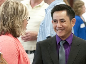Dr. Binh Van, who is one of Clinton’s two new doctors, mingles during a welcome reception on May 29.