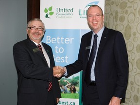 Jim Lynn, CEO of United Communities Credit Union (left) and Stephen Bolton, CEO of Libro Credit Union announced a merger of their two companies in London, Ontario on Wednesday, June 5, 2013. (DEREK RUTTAN, The London Free Press)