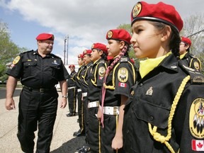 An RCMP Sergeant inspects Hobbema-based cadets during a past year’s National Aboriginal History at the Alberta Legislature Building. FILE PHOTO QMI Agency