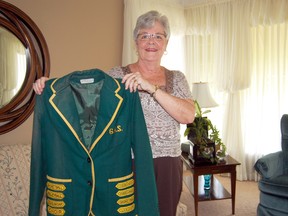 Former students from the class of 1963 at Annandale High School in Tillsonburg are gathering together on June 14, 2013 at the Tillsonburg Soccer Club for a 50th high school reunion. Sharon Nunn, a member of the reunion committee, holds up one of her high school jackets, seen here. The reunion is open to those who attended Annandale and Glendale High Schools between 1962-1964 in Tillsonburg. For more information call Joan Mahony at (519) 842-4652.    

KRISTINE JEAN/TILLSONBURG NEWS/QMI AGENCY