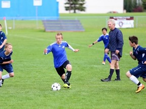 Fort McMurray Fury player Austin Couture takes the ball up field in a game in Edmonton last month. Couture will be playing for the U13 Alberta North provincial soccer team this summer. 

PADRAICMCCOMBE/SUPPLIED PHOTO