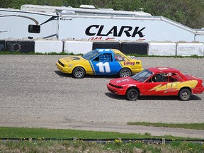Mini Stock action from Hythe Motor Speedway last weekend: #55 Mitch Diesel and #11 Matt Reeve battle down the stretch. (Photo by Tammy Diesel)
