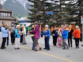 The Mountain Grannies of Canmore and Banff do a ‘granny dance’ before setting off on their fourth annual walk to support the Stephen Lewis Foundation Grandmothers to Grandmothers Campaign on Sunday.