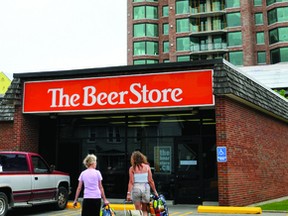 Two customers approach Brockville's downtown Beer Store outlet. (NICK GARDINER /he Recorder and Times)