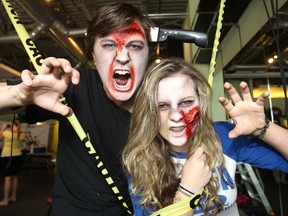 Calgary teen cancer survivors L-R, Gordon Brook and Kylie Needham from the Kids Cancer Care community had an extreme zombie-style makeover in preparation for the Zombie Survivor Race, a 5-km run on July 20 here in Cochrane.