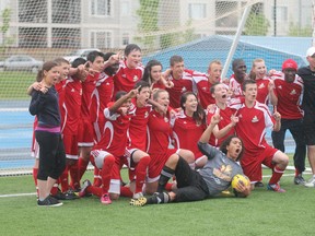 Father Patrick Mercredi High School's soccer team celebrates after winning the city championship Wednesday evening. ANDREW BATES/TODAY STAFF