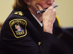 Chief Cory McMullan listens to the discussion during a Belleville Police Services Board meeting at city hall in Belleville, Ont. Thursday, June 6, 2013. A more orderly meeting meant the chief was not on the defensive against members questioning her budget. Luke Hendry/The Intelligencer/QMI Agency