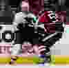 Ottawa Senators Sergei Gonchar takes Anaheim Ducks Jason Blake into the boards during first period action at Scotiabank Place. January 18,2011. (ERROL MCGIHON/THE OTTAWA SUN)