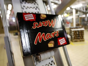 A package of Mars chocolate bars is pictured on the production line in this September 21, 2007 in the French factory in Haguenau. AFP