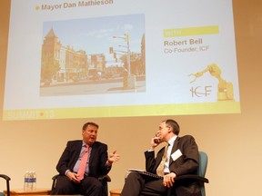 Mayor Dan Mathieson tells Stratford's story to Intelligent Community Forum co-founder Robert Bell Thursday during the ICF's annual summit in New York. MIKE BEITZ The Beacon Herald