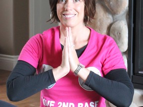 Yoga on the Beach is a fundraiser for Team Save Second Base on their road to the CIBC Run for the Cure in October. Leah Blanchette, one of the organizers for Team Save Second Base, said she finds peace in yoga.