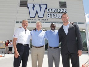 Winnipeg Blue Bombers CFL fans assembled at Investors Group Field in Winnipeg to honour four fan favorite former players who had one of the four main gates named after them.  These are the four former players, from the left; Ken Ploen, Joe Poplawski, Milt Stegall, and Doug Brown.  Wednesday, June 5, 2013.