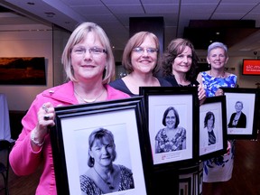 Some of the 2013 Strong, Smart and Bold Women of the Year pose with their portraits after being honoured at the Girls Inc. celebration at St. Lawrence College on Thursday night. From left are Annie Francois, Marg Fancy, Shelli Warren and JoAnne Sytsma. Absent from the photo are Samantha Cameron and Leslie Fournier.
