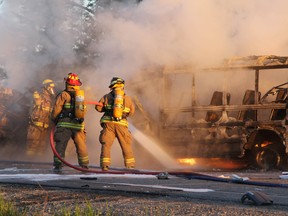 A fiery two-vehicle collision east of the junctions of Highway 101 and Highway 144 in Bristol Township early Friday morning has claimed a pair of lives. Firefighters from the Timmins and Mountjoy halls responded shortly after 5 a.m. to the collision that involved a school bus and a mini-van near the turnoff to Lake Shore Gold. LEN GILLIS/Timmins Times