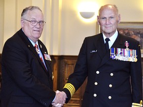 PHOTO COURTESY OF LT.-GOV. ETHELL'S FLICKR PAGE HIGH RIVER TIMES. From left: Lieutenant Governor Ethell with Hon. Capt. Bill Wilson after presenting the Hon. Capt. with the Diamond Jubilee Medal.