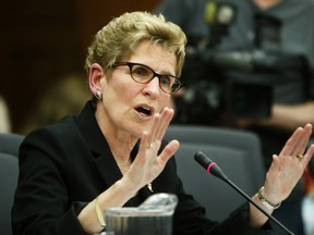 Ontario Premier Kathleen Wynne appears before the gas plant committee at Queen's Park on April 30, 2013. (CRAIG ROBERTSON/TORONTO SUN)