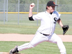 Soo Midget Black Sox pitcher Josh Lumley (4) throws a pitch to a player from the Eastern Upper Peninsula Travelers during Friday's game at the 19th Annual Soo Black Sox.
