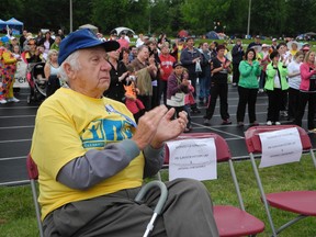 Ross Avey of Paris, a 19-year survivor, looks on during the opening ceremonies at the 12th annual Brantford Relay For Life event at the Steve Brown Sports Complex. Avey was one of 111 survivors on hand for the opening lap Friday, June 7, 2013. (SUSAN GAMBLE Brantford Expositor)