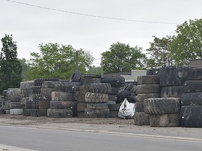 People living in the area of Alice and Murray Streets are upset over the piles of tires at the rear of a building which houses a tire recycler. (BRIAN THOMPSON Brantford Expositor)