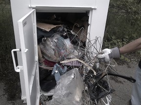 A photo of some of the garbage packed into one of the Kidney Foundation bins doesn't even begin to describe how foully the bins were defaced, said Kidney Clothes Operations Manager Sarah Robertson.