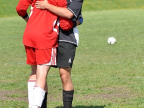 The Ontario Federation of School Athletic Associations Boys ‘A’ Soccer Championship wrapped up on Saturday at the Timmins Regional Athletics and Soccer Complex with the Ecole Secondaire Catholique Renaissance Phoenix edging the Ridley College Tigers 1-0 in a game that was both tactical and creative. Phoenix defender Nicholas Bertrand embraces goalkeeper Benjamin Simone following the win.