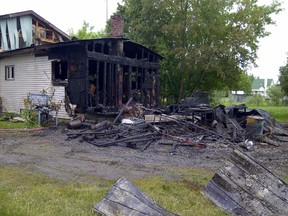 Fire destroyed a garage at this County Road 43 home Saturday and caused extensive damage to the residence.