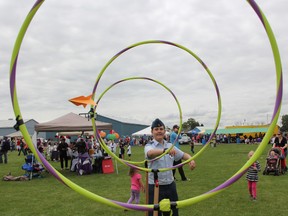 Cpl. Joshua Shand, 15, of Sarnia's Royal Canadian Air Cadets squadron, watches his paper airplane sail through hoops at the 17th annual Kids Funfest Saturday. Hundreds of families turned out for a day of demonstrations, inflatables and crafts behind Clearwater Arena.