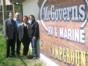 Evergreen Park general manager Dan Gorman, and sponsorship manager Don Moon, pose with McGovern’s RV owners Dwain McGovern and his wife Val McGovern at Evergreen Park. McGovern’s RV has recently purchased the naming rights of the former Stompede Campground. Aaron Hinks/Daily Herald-Tribune