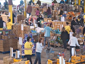 Shoppers navigate through aisles of merchandise on Saturday morning at the 11th annual Brant United Way Giant Warehouse Sale. (Brian Thompson, The Expositor)