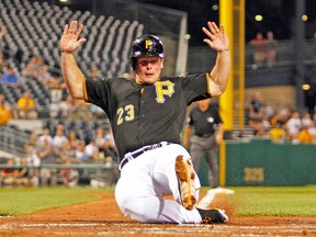 When things are going badly, Travis Snider doesn’t throw up his hands. He goes back to the batting cage and keeps plugging away. The Pirates outfielder says it’s not healthy, professionally, to play the game with panic or fear. (Getty Images)