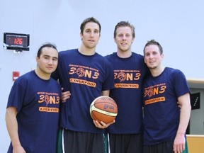 Left to right: Michael Linklater, Michael Lieffers, Troy Gottselig and Trevor Nerdahl pose after winning the FIBA 3x3 World Masters qualifying tournament at the Saville Community Sports Centre in Edmonton on June 9, 2013.