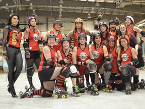 The Headstone Honeys and their mascot Satina Loren gather for a group photo following the Honeys home opener against the Nodak Knockouts from Minot, ND. The team was able to secure a win in front of the home crowd with a final score of 251 to 120. (Submitted photo by John Kushniruk)