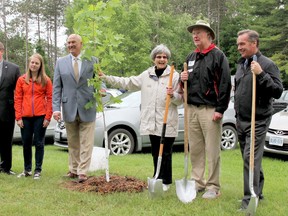 MPP Rob Milligan, Kayli Voskamp (youngest member of summer staff Presqu'ile Park), MP Rick Norlock, original Presqu'ile board directors Liz Chatten and Glenn Spence and Brighton Mayor Mark Walas planted six trees Saturday during the 25th anniversary of the park.
Submitted photo