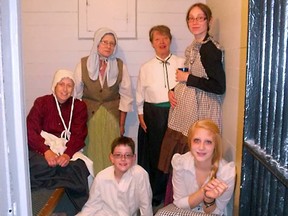 The Huron Historic Gaol is seeking volunteers, such as those in this 2013 file photo, for the Behind the Bars tours this summer. (Signal Star file photo)