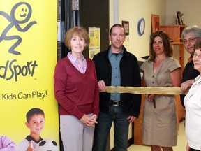 KidSports Timmins’ new location was unveiled at the Archie Dillon Sportsplex on Monday. Kidsport was also pleased to reveal that thanks to the generosity of Goldcorp, Norfab and the Torchia Group, the rent for the new office has been paid for the next five years. Taking part in the ribbon-cutting ceremony are, from left, Anne MacDonald, Terry Ditullio, Cheryl Allard. Domenic Rizzuto and Colleen Landers.