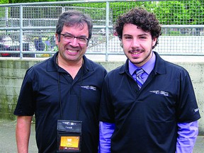 Bev Facey teacher Gerald Chung (left) stands with student Michael Prior at the Skills Canada National Competition in Vancouver this past weekend. Photo Supplied