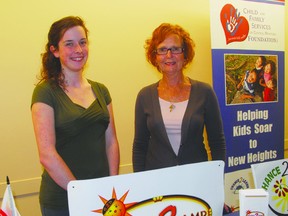 Olivia Decaire and Jody Fletcher of the Child and Family Services of Central Manitoba Foundation pictured at the local United Way's AGM, at the Herman Prior Centre in Portage la Prairie on April 10, 2012.  The foundation will be having a barbecue on Thursday to raise funds to send kids to camp through the Chance 2 Camp program. (FILE PHOTO)