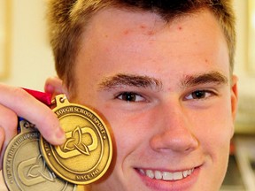 Riley Bell, of Central Elgin, repeated as the goal medallist in the long jump and also won the silver medal in the triple jump at the OFSAA track and field championships. R. MARK BUTTERWICK / St. Thomas Times-Journal / QMI AGENCY