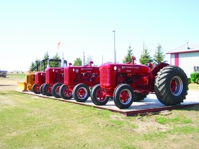 A number of antique McCormick tractors are among those that will be up for auction at Dave Schmidt’s place north of Wembley this weekend. (Supplied)